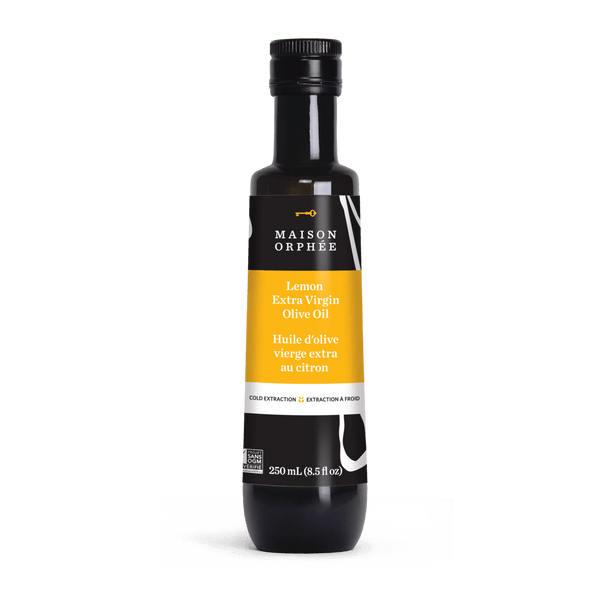 Huile d'olive au citron. La couleur et l'arôme incomparables de cette huile sont obtenus grâce au pressage des olives et des citrons. Un super assaisonnement pour les poissons.